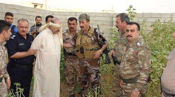 اعتقال احد اقارب الرئيس العراقي السابق: صدام حسين (صور)